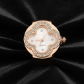 Snow Dial Rose Gold Ring Watch Straight On Black Velvet